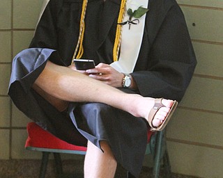 William d Lewis The vindicator HArding grad Michael Miller stayed cool during 5-26-16 commencement at PAckard Music Hall in Warren. he wore shorts and flip flops under his gown.