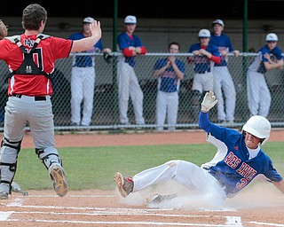 05-26-16- BASEBALL- Regional Semi Final D4- Lorain, OH, USA; BASEBALL-Western Reserve Blue Devils vs Sycamore Mohawks Warriors at The Pipe Yard Stadium Powered by FirstEnergy Solutions..Bottom 2nd inning, Western Reserve Blue Devils Ryan Demsky (3) slides across home plate forWestern Reserve Blue Devils' 1st run.  The Western Reserve Blue Devils beat Sycamore Mohawks Warriors 6-0.    Mandatory Credit: Michael Taylor-Youngstown Vindicator..