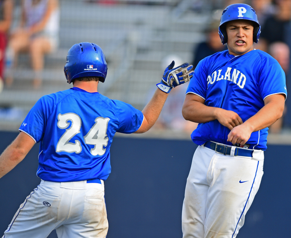 HUDSON, OHIO - MAY 26, 2016: Nick Petrolla #23 of Poland is congratulated by teammate Dan Klase #24 after scoring a run in the third inning of Thursday afternoons Division 2 Regional Semi-Final game at the Ballpark at Hudson. Poland won 8-2. DAVID DERMER | THE VINDICATOR