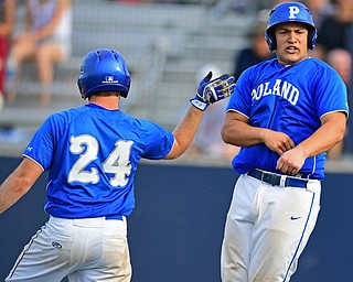HUDSON, OHIO - MAY 26, 2016: Nick Petrolla #23 of Poland is congratulated by teammate Dan Klase #24 after scoring a run in the third inning of Thursday afternoons Division 2 Regional Semi-Final game at the Ballpark at Hudson. Poland won 8-2. DAVID DERMER | THE VINDICATOR