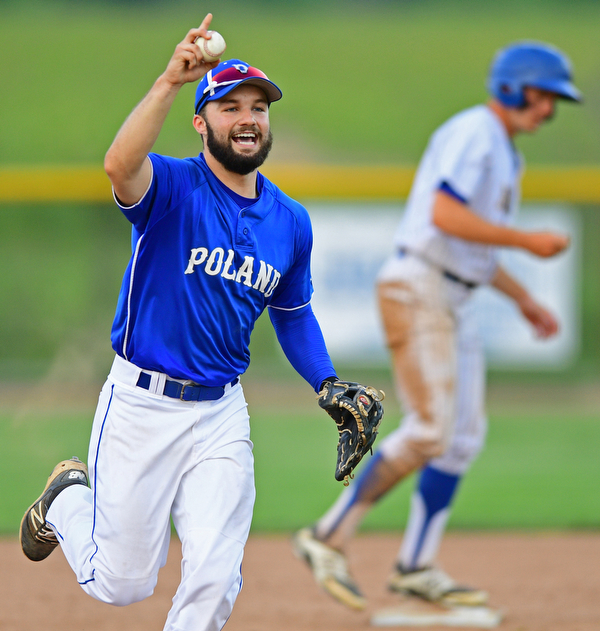 HUDSON, OHIO - MAY 26, 2016: Short stop Anthony Calcagni #4 of Poland celebrates after forcing out Nicholas Mann #13 of NDCL at second base for the final out in the seventh inning of Thursday afternoons Division 2 Regional Semi-Final game at the Ballpark at Hudson. Poland won 8-2. DAVID DERMER | THE VINDICATOR