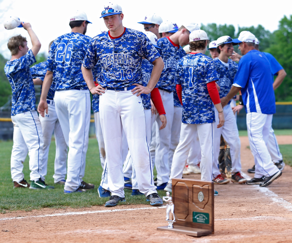 052716 - Western Reserve's Jake Clark (13) and his teammates wait for their runners up trophy after Friday's Division IV regional final against Cuyahoga Heights at The Pipe Yard in Lorain. The Blue Devils fell to the Redskins 6-5. Michael Taylor | The Vindicator