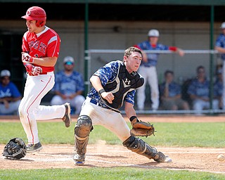 052716 - Western Reserve's Ryan Slaven waits for the ball as Cuyahoga Heights' Matt Harris scores during Friday's Division IV regional final against Cuyahoga Heights at The Pipe Yard in Lorain. The Blue Devils fell to the Redskins 6-5. Michael Taylor | The Vindicator