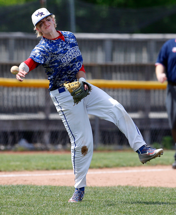 052716 - Western Reserve's Walker Marlowe (23) fires to 1st base to get the out during Friday's Division IV regional final against Cuyahoga Heights at The Pipe Yard in Lorain. The Blue Devils fell to the Redskins 6-5. Michael Taylor | The Vindicator.