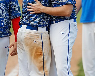 052716 - Western Reserve's teammates Jeep DiCioccio (2)(left) and, senior, Jake Clark (13) share a hug after their loss to Cuyahoga Heights Redskins 6-5.