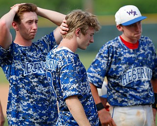 052716 - Western Reserve players wait for the runner ups trophy after Friday's Division IV regional final against Cuyahoga Heights at The Pipe Yard in Lorain. The Blue Devils fell to the Redskins 6-5. Michael Taylor | The Vindicator