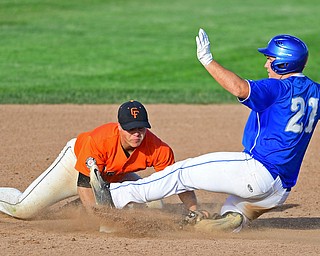 HUDSON, OHIO - MAY27, 2016: Pad O'Shaughnessy #21 of Poland slides into second for a double beating the tag from Cole Newbauer #1 of Chagrin Falls in the sixth inning of Friday afternoons Division Two Regional Final at the Ballpark at Hudson. Poland won 13-3. DAVID DERMER | THE VINDICATOR