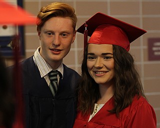 Nikos Frazier | The  Vindicator.Eric Pappada(left) and Hailey Vigorito(right) pose for a photo before walking into Packard Music Hall to recieve their diplomas from Niles McKinely High School.