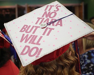 Nikos Frazier | The  Vindicator."It's no tiara but it will do," is written on a graduating Niles McKinley student's cap in Packard Music Hall.