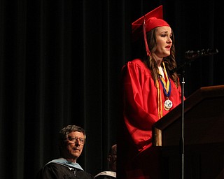 Nikos Frazier | The  Vindicator.Mark Lucas(bottom), principal of Niles McKinley High School, looks up at valedictorian Jaclyn Rowley, in Packard Music Hall on Saturday, May 28, 2016.