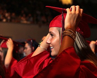 Nikos Frazier | The  Vindicator.Sara Marz turns her tassel after recieving her diploma from Niles McKinley High School at Packard Music Hall on Saturday, May 28, 2016.