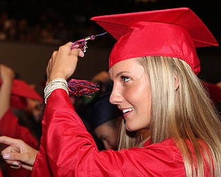 Nikos Frazier | The  Vindicator.Sara Marz turns her tassel after receiving her diploma from Niles McKinley High School at Packard Music Hall on Saturday, May 28, 2016.