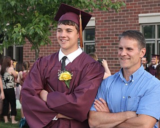 Nikos Frazier | The  Vindicator.Mitch Dolak(left) and his uncle, Marty Stovar pose for photos after receiving their diplomas from South Range High School on Saturday, May 28, 2016.