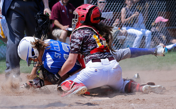 05282016- South Range Raiders' catcher Hanna Dennison (16) tags out Northwestern Huskies' Ally St. Clair in the Division III regional finals against Northwestern. The South Range Raiders would go on to win 1-0 at Massillon Washington High School. Michael Taylor | The Vindicator.