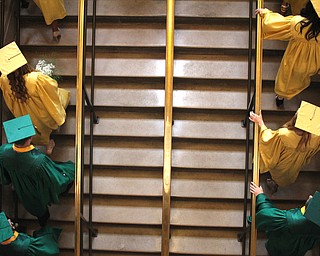 Nikos Frazier | The Vindicator..Ursline High School class of 2016 walks upstairs in Stambaugh Auditorium to receive their diplomas on Sunday, May 29, 2016.