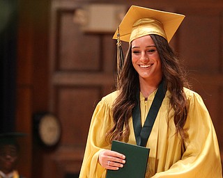 Nikos Frazier | The Vindicator..Makayla Berry walks off stage after receiving her diploma from Ursline High School.
