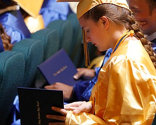 ROBERT K. YOSAY | THE VINDICATOR..Sara Reichard checks out her diploma..Valley Christian Schools --Highway Tabernacle Church..almost 40 graduates celebrated graduation - ..-30-