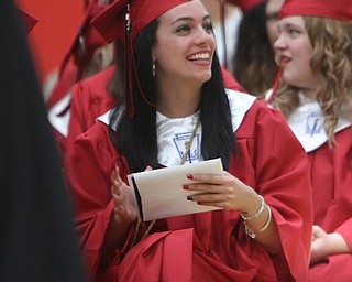 Class president Tiffany Gillen smiles at the crowd afte receiving her diploma during the Struthers High School Commencement on Sunday afternoon. Dustin Livesay | The Vindicator 5/29/16 Struthers High School