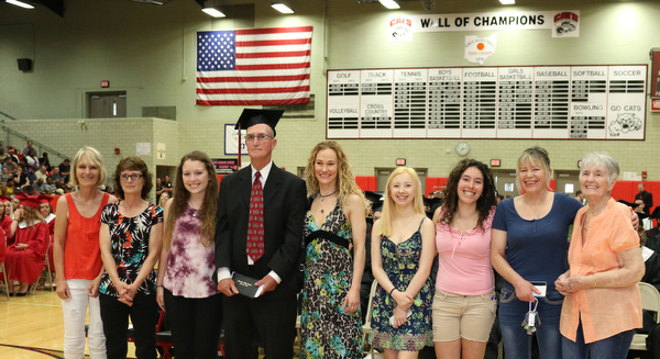 Honorary veteran graduate, Robert Wallace (center) poses for a picture with his family after he was given a diploma during the Struthers High School Commencement on Sunday afternoon.   Dustin Livesay   |   The Vindicator 5/29/16  Struthers High School    (the whole famile left and I could not get names. )