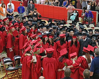 The graduating class of Struthers High School form a circle while singing the alma mater to conclude the Struthers High School Commencement on Sunday afternoon. Dustin Livesay | The Vindicator 5/29/16 Struthers High School