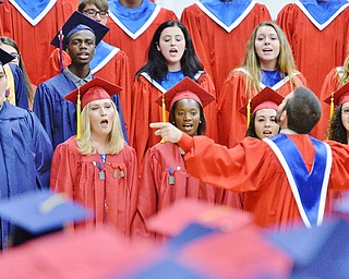 Jeff Lange | The Vindicator SUN, MAY 29, 2016 - The Fitch Concert Choir featuring members of the class of 2016 performs the class song during Sunday's commencement at Austintown Fitch High School.