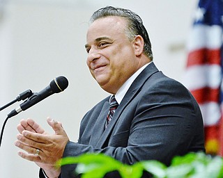 Jeff Lange | The Vindicator SUN, MAY 29, 2016 - David Cappuzzello applauds the parents in attendance of Sunday's commencement at Girard High School.