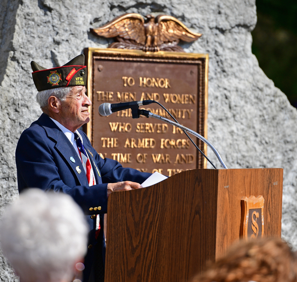 STRUTHERS, OHIO - MAY 30, 2016: Ray Ornelas of the Veterans Service Commission speaks at the podium Monday morning during a fallen soldier memorial dedication at Struthers High School. DAVID DERMER | THE VINDICATOR