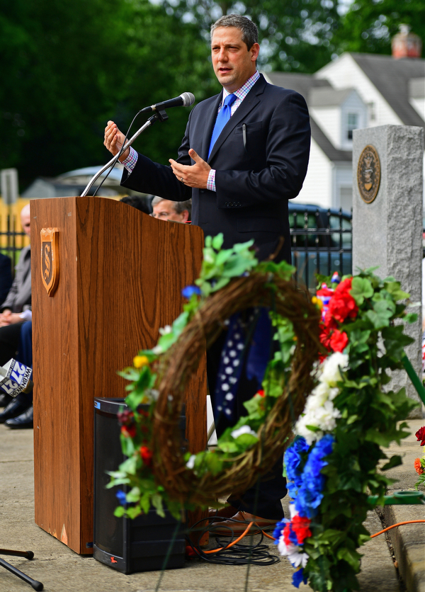 STRUTHERS, OHIO - MAY 30, 2016: U.S. Congressman Tim Ryan speaks at the podium Monday morning during a fallen soldier memorial dedication at Struthers High School. DAVID DERMER | THE VINDICATOR