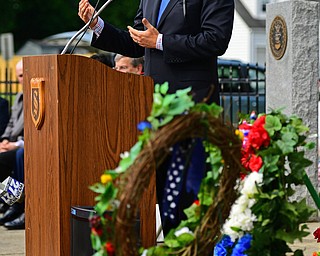 STRUTHERS, OHIO - MAY 30, 2016: U.S. Congressman Tim Ryan speaks at the podium Monday morning during a fallen soldier memorial dedication at Struthers High School. DAVID DERMER | THE VINDICATOR