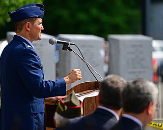 STRUTHERS, OHIO - MAY 30, 2016: Ohio State Representative John Boccieri speaks at the podium Monday morning during a fallen soldier memorial dedication at Struthers High School. DAVID DERMER | THE VINDICATOR
