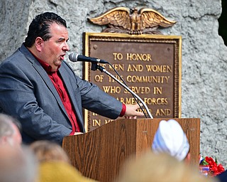 STRUTHERS, OHIO - MAY 30, 2016: Mahoning County Commissioner Anthony Traficanti speaks at the podium Monday morning during a fallen soldier memorial dedication at Struthers High School. DAVID DERMER | THE VINDICATOR