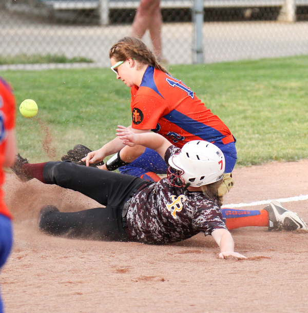 William D. Lewis\The Vindicator.South Range's Madison Weaver(8) is safe at third as Edison's Jessica Stoll(10) loses the ball during June 2, 2016 game in Akron.