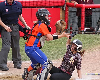 William D. Lewis\The Vindicator.South Range's Felicia Gaeta (1) scores while Edison catcher Hannah McGinley(9) waits for th throw during Thursday June 2, 2016 action at Akron.