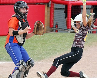 William D. Lewis\The Vindicator.South Range's Morgan Czopur (20) scores while Edison catcher Hannah McGinley(9) waits for the throw during June 2, 2016 action in Akron.