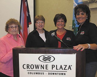 SPECIAL TO THE VINDICATOR
Members of the Austintown Jr. Women’s League attended the 119th Annual State Convention of the General Federation of Women’s Clubs in Columbus, where the club was recognized with several awards. Some of the awards presented to AJWL included outstanding participation in international outreach, outstanding participation in public issues, communications and public relations, partnering with UNICEF, and a club creativity award. From left are Shirley Schmidt, Janice Simmerman, President Kathy Rusback and Ruty Rodriquez-Patterson, who were among the members who attended the convention.