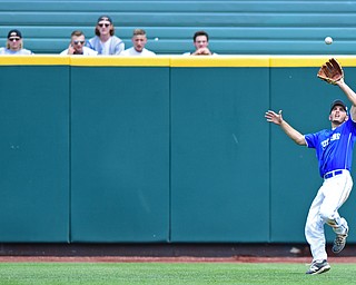 COLUMBUS, OHIO - JUNE 2, 2016: Left fielder Tony Chairo #20 of Poland gets under the ball for the out in the sixth inning of Thursday afternoons Division Two State Semi-Final game at Huntington Park. Hamilton Badin won 8-3. DAVID DERMER | THE VINDICATOR
