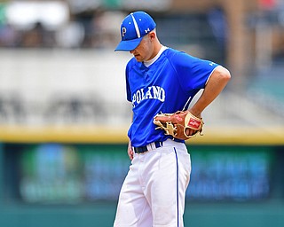 COLUMBUS, OHIO - JUNE 2, 2016: Pitcher Jared Burkert #6 of Poland hangs his head not he pitchers mound after hitting a batter and before being removed from the game after seven total pitches in the sixth inning of Thursday afternoons Division Two State Semi-Final game at Huntington Park. Hamilton Badin won 8-3. DAVID DERMER | THE VINDICATOR