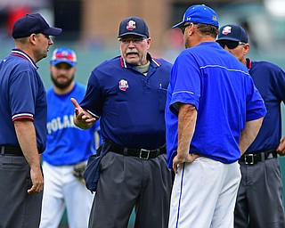 COLUMBUS, OHIO - JUNE 2, 2016: Manager Rich Murry of Poland gets a explanation after a controversial call that was overturned by the third base umpire in the seventh inning of Thursday afternoons Division Two State Semi-Final game at Huntington Park. Hamilton Badin won 8-3. DAVID DERMER | THE VINDICATOR