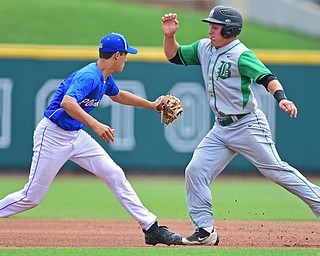 COLUMBUS, OHIO - JUNE 2, 2016: Third baseman B. O'Shaughnessy #10 of Poland reaches to tag out base runner Cody Boxrucker #20 of Hamilton Badin as he attempts to advance to third base in the first inning of Thursday afternoons Division Two State Semi-Final game at Huntington Park. Hamilton Badin won 8-3. DAVID DERMER | THE VINDICATOR