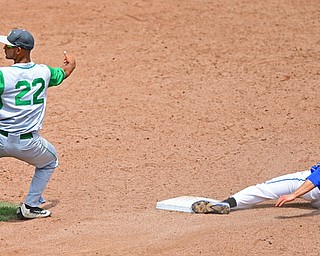 COLUMBUS, OHIO - JUNE 2, 2016: Short stop Daunte DeCello #22 of Hamilton Badin shows the ball to the umpire after tagging out base runner Eric White #2 of Poland who was attempting to steal second base in the fifth inning of Thursday afternoons Division Two State Semi-Final game at Huntington Park. Hamilton Badin won 8-3. DAVID DERMER | THE VINDICATOR