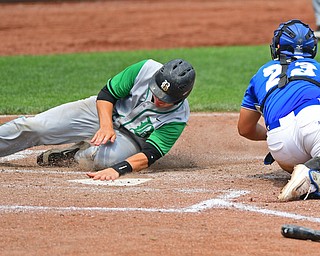 COLUMBUS, OHIO - JUNE 2, 2016: Cody Boxrucker #20 of Hamilton Badin slides across home plate beating the tag from Nick Petrol #23 of Poland in the sixth inning of Thursday afternoons Division Two State Semi-Final game at Huntington Park. Hamilton Badin won 8-3. DAVID DERMER | THE VINDICATOR