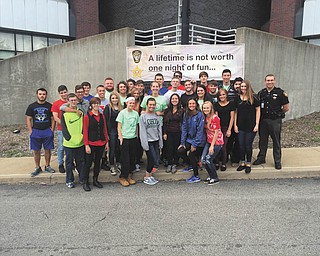 SPECIAL TO THE VINDICATOR
A group of Jackson-Milton High School seniors visited Mahoning County Justice Center in Youngstown on May 13 for Prom Promise, a pledge to family, school and friends to avoid alcohol and make good decisions during prom. At the Justice Center, the students toured the facility to see daily operations and met with county sheriff’s deputies to discuss alcohol and drug abuse, interactions with police officers, respect and other issues. A small group of inmates also met with the students to urge smart decision- making and accountability; the inmates discussed the challenges of adulthood, sharing their personal stories and using them as a teaching tool.