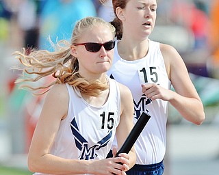 Jeff Lange | The Vindicator  FRI, JUN 3, 2016 - McDonald's Brenna Rupe (right) trails behind teammate Heidi Hoffman after making the handoff in the girls 4x800 meter relay race during the OHSAA State track and field tournament at Jesse Owens Memorial Stadium in Columbus on Friday.