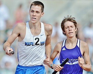 Jeff Lange | The Vindicator  FRI, JUN 3, 2016 - Maplewood's Jake Hall passes a Mount Gilead competitor in the boys 4x800 meter relay race during the OHSAA State Track and Field tournament at Jesse Owens Memorial Stadium in Columbus.