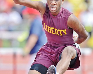 Jeff Lange | The Vindicator  FRI, JUN 3, 2016 - Liberty's Justin Clark clears a hurdle in the boys 300 meter hurdles event during Friday's OHSAA State Track and Field tournament held at Jesse Owens Memorial Stadium in Columbus.