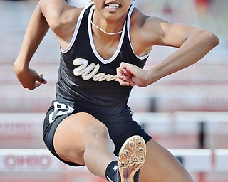 Jeff Lange | The Vindicator  FRI, JUN 3, 2016 - Warren Harding's Gariana Bercheni clears a hurdle in the girls 100 meter hurdles event during Friday's OHSAA State Track and Field tournament at Jesse Owens Memorial Stadium in Columbus. Bercheni placed fifteenth overall with a time of 15.07 seconds.