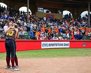 AKRON, OHIO - JUNE 4, 2016: Morgan Caopur #20 of South Range hugs teammate Felecia Gaeta #1 on the field after being defeated in Saturday afternoons Division 3 State Title game at Firestone Stadium. Wheelersburg won 8-3. DAVID DERMER | THE VINDICATOR