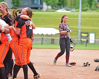AKRON, OHIO - JUNE 4, 2016: Felecia Gaeta #1 walks to the dugout after being stranded on second base while the Wheelersburg players celebrate winning on the infield after the seventh inning of Saturday afternoons Division 3 State Title game at Firestone Stadium. Wheelersburg won 8-3. DAVID DERMER | THE VINDICATOR