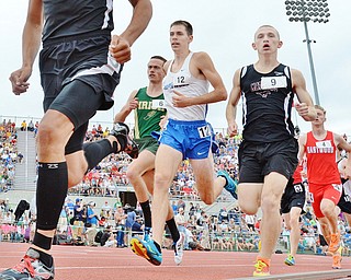 Jeff Lange | The Vindicator SAT, JUN 4, 2016 - Maplewood's Allen Sparks (center) and Mathews' Kenny Wallace (right) compete in the boys 1,600 meter run during Saturday's OHSAA State Track and Field tournament held at Jesse Owens Memorial Stadium in Columbus. Sparks and Wallace finished fourth and fifth with times of 4:19.70 and 4:19.88, respectively.