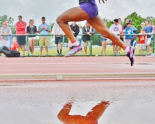 Jeff Lange | The Vindicator SAT, JUN 4, 2016 - After a brief storm delay, Pickerington Central's Trinity Brown competes in the Division I girls 4x100 meter relay race during the OHSAA State Track and Field tournament held at Jesse Owens Memorial Stadium in Columbus on Saturday, June 4, 2016.